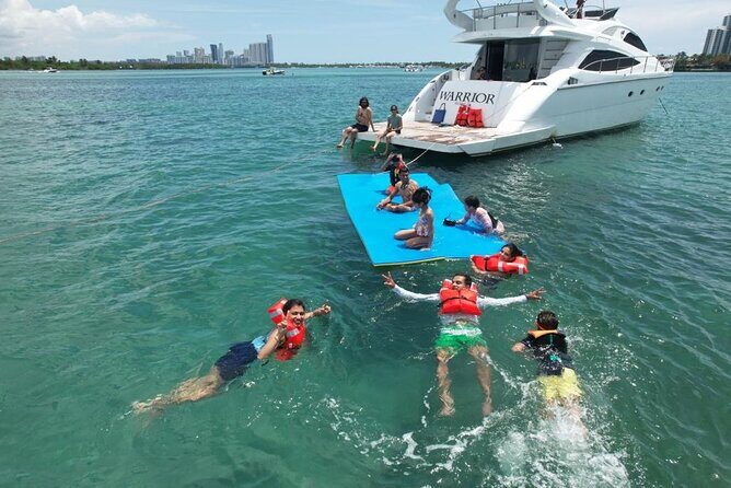 65ft Yacht Charter in Miami - Onboard Comfort Check: 3 Beds, Cold A/C, and a Flybridge Wet Bar