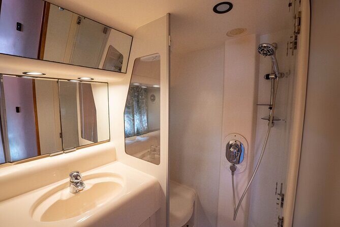70ft + Free Hour | Miami Yacht Rental | 3 to 8 Hours | 13 ppl - Comfort on deck for 13 people: music, restroom reality, and the small stuff