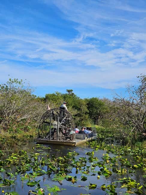 Everglades: boat tour with transportation& entrance included - Pickup points and the dark green SUV rhythm