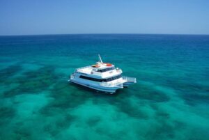Key West: Glass Bottom Boat Reef Tour with Sunset Option - The 65-foot catamaran setup: glass windows, AC, and a sundeck