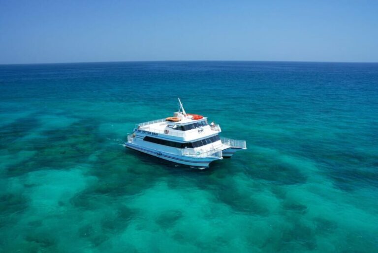 Key West: Glass Bottom Boat Reef Tour with Sunset Option - The 65-foot catamaran setup: glass windows, AC, and a sundeck