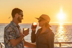Key West Sunset Buffet Dinner Cruise with Open Bar and Live Music - Boarding the Luxury Catamaran: Decks, Comfort, and Restrooms