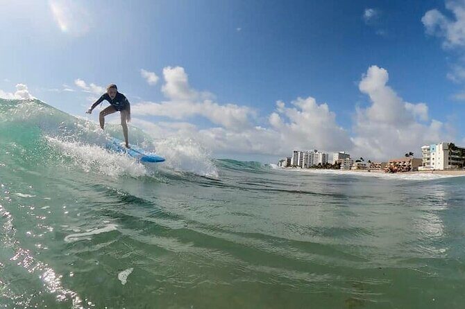Learn to surf Fort Lauderdale - In the water: guided waves and quick wins