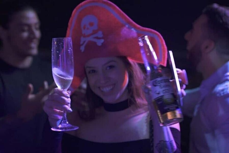Miami Party Boat Cruise with City Lights & Skyline Views - Getting to the dock: Lombardi’s Café, Hard Rock umbrella, and 401 Biscayne