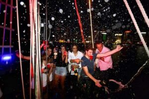 Miami Party Boat Cruise with City Lights & Skyline Views - The boat vibe: live DJ, dancing, and a cash bar