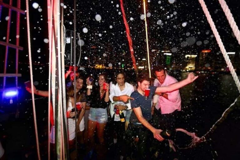 Miami Party Boat Cruise with City Lights & Skyline Views - The boat vibe: live DJ, dancing, and a cash bar