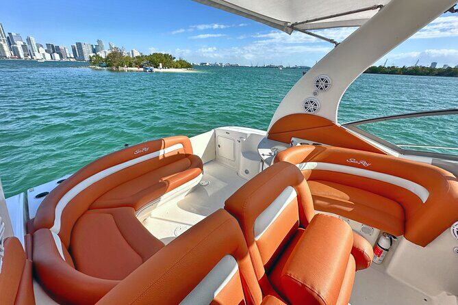 Private Captained Boat Tour in Miami for up to 12 Passengers - Fisher Island celebrity homes: the shoreline side of Miami