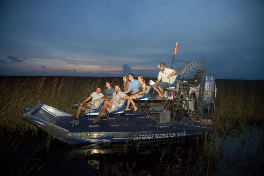 Sawgrass Park: Private 1-Hour Airboat Adventure Tour - Alligator and Reptile Exhibit: Touching a Baby Alligator